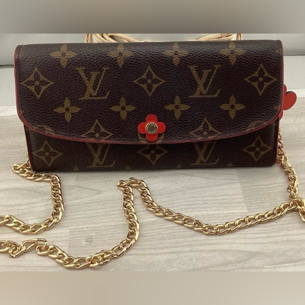 Louis Vuitton Brown Monogram Clutch with Red Accent